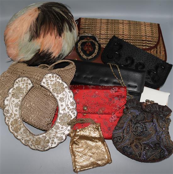 A collection of bags and a feather hat